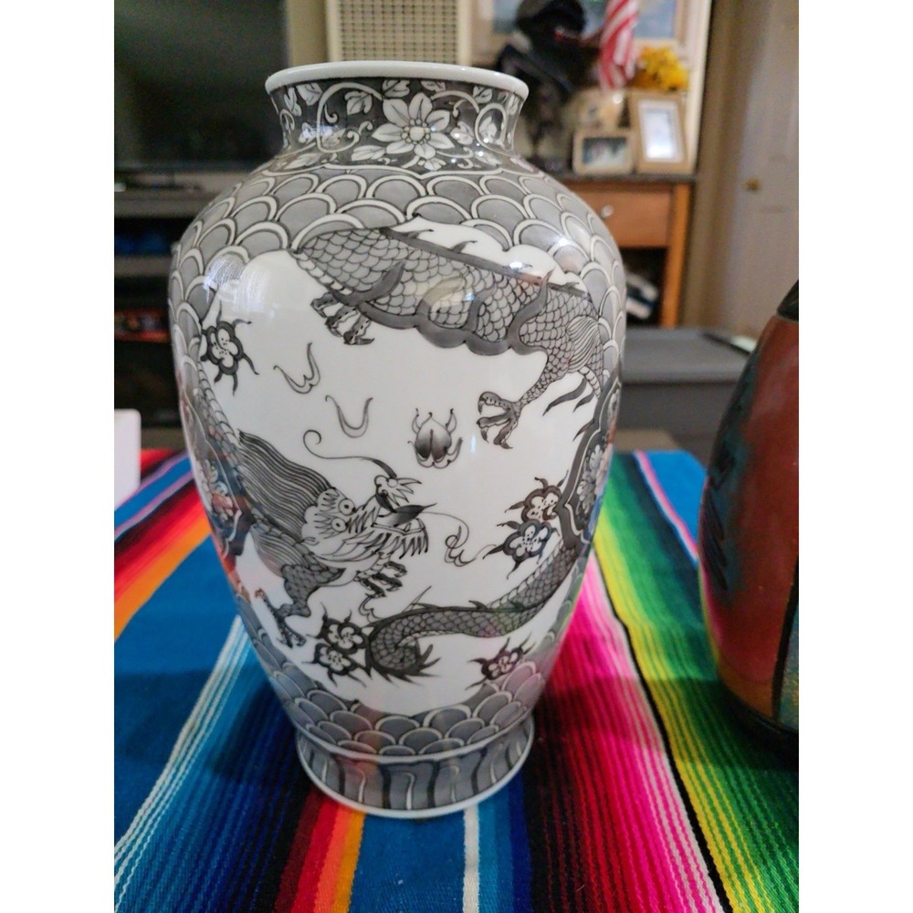 This Black And Grey Chinese Vase Is Porcelain Designed‎ and Signed.